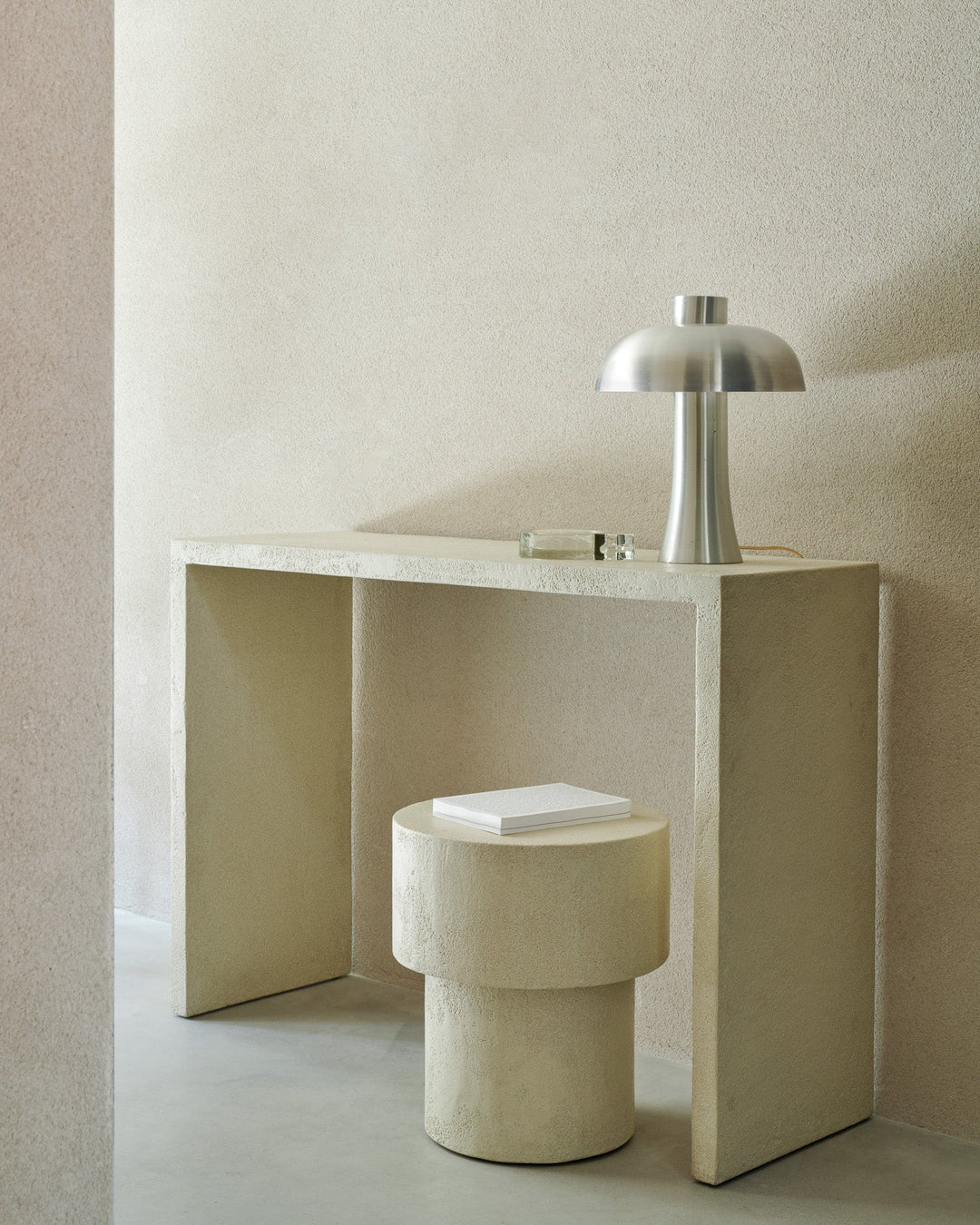 26420 Elements console microcement off white 26410 Elements side table microcement mushroom shape off white clean web