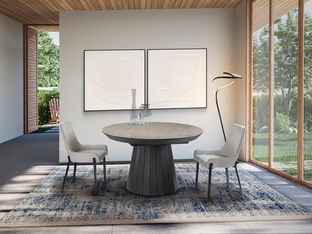 Masă dining Schuller Koria rotundă Ø130 cm extensibilă cu blat piatră mată și structură negru mat