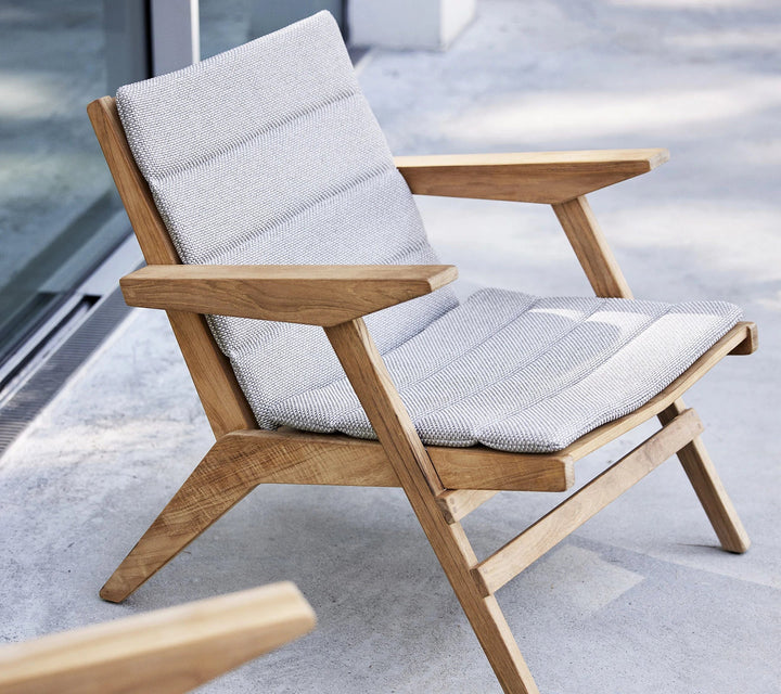 The Decorators: Fotoliu de exterior ajustabil Cane-line Flip