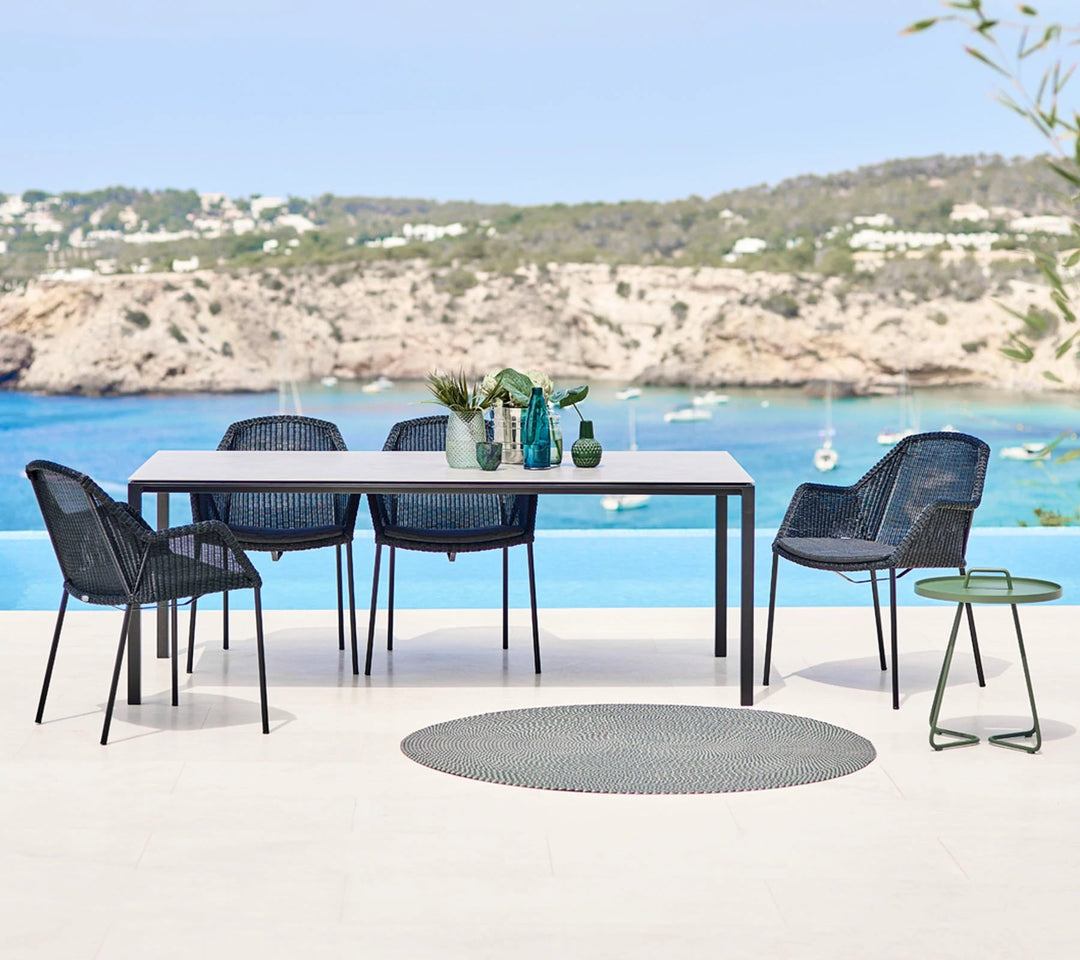 The Decorators: Scaun de exterior Cane-line Breeze Gri