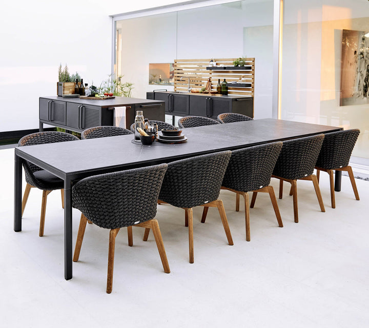 The Decorators: Scaun de exterior Cane-line Peacock Gri deschis