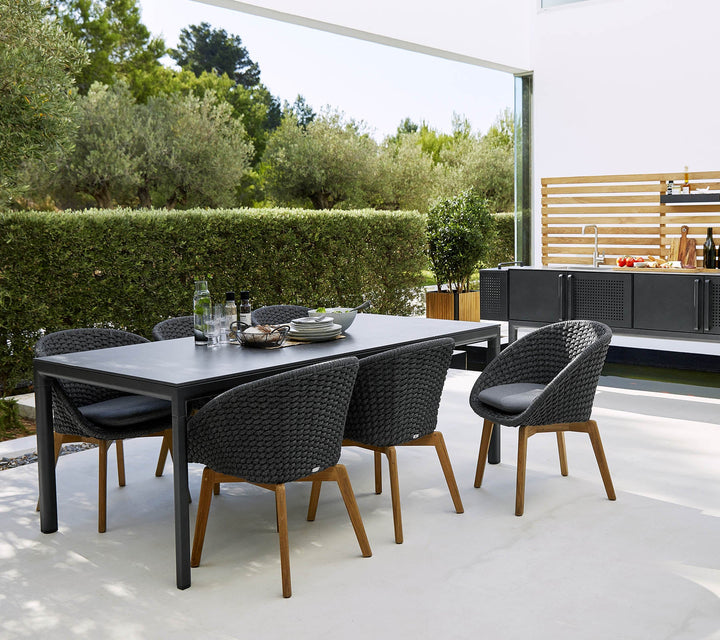 The Decorators: Scaun de exterior Cane-line Peacock Gri deschis