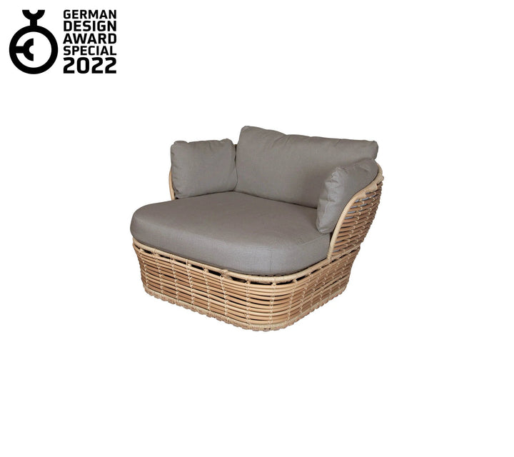 The Decorators: Fotoliu de exterior Cane-line Basket lounge Natural