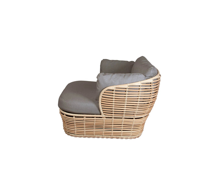 The Decorators: Fotoliu de exterior Cane-line Basket lounge Natural