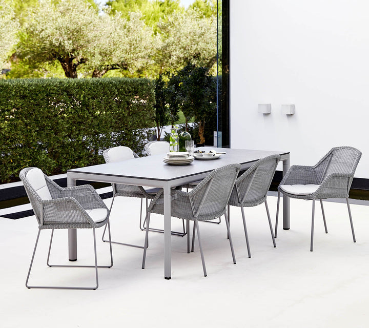 The Decorators: Masa de exterior Cane-line Drop Lava grey/Fossil grey