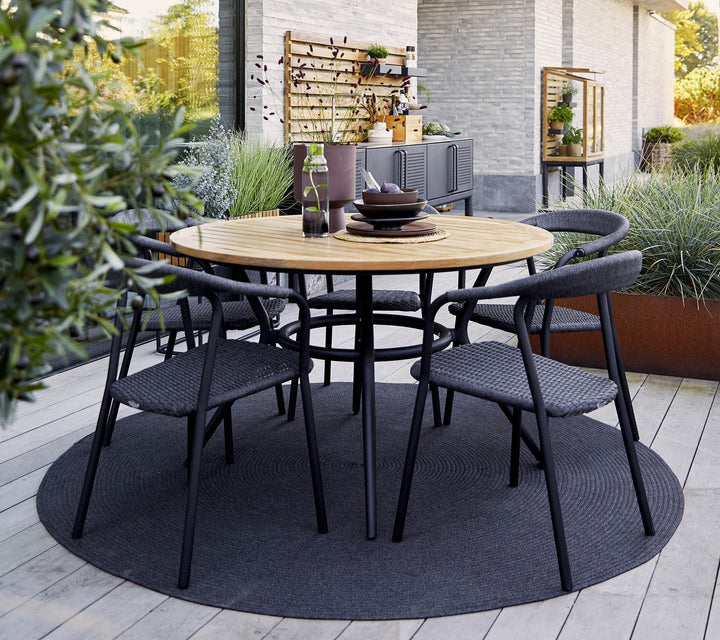 The Decorators: Masa de exterior rotunda Cane-line Joy Taupe/Travertine look