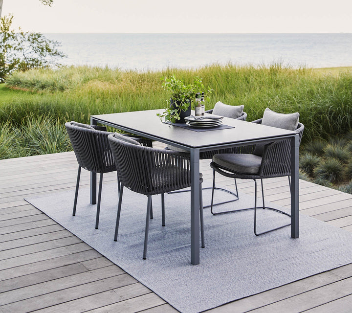 The Decorators: Masa de exterior Cane-line Pure 150x90 cm Lava Grey/Basalt