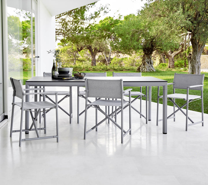 The Decorators: Masa de exterior Cane-line Drop Lava grey/Fossil grey