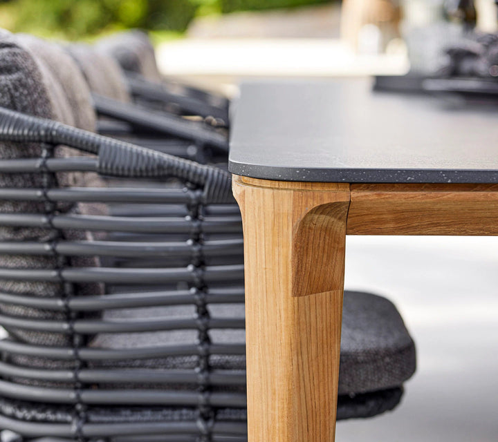 The Decorators: Masa de exterior Cane-line Aspect Teak/Fossil black