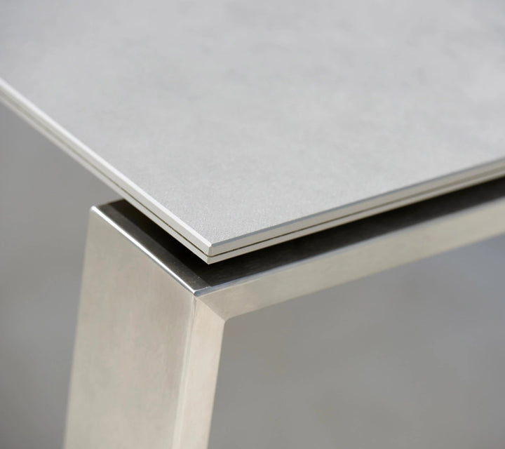 The Decorators: Masa de exterior Cane-line Edge 210/330x100 cm Stainless Steel/Concrete grey